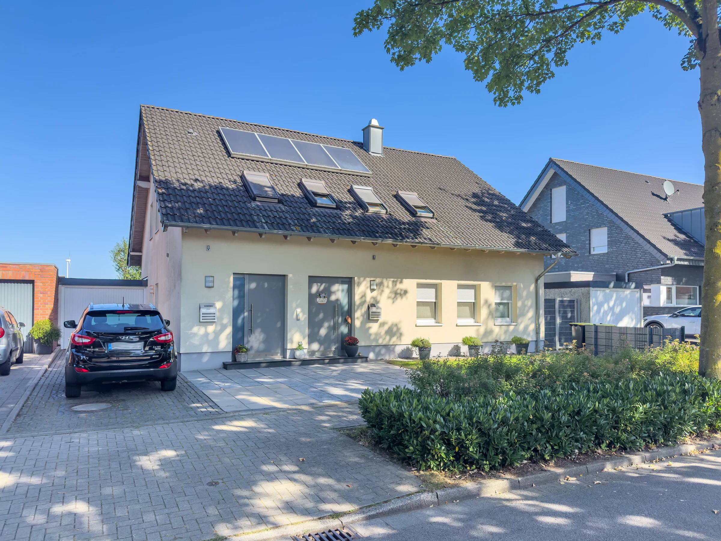 Neuwertiges Zweifamilienhaus in begehrter Feldrandlage von Raesfeld Titelbild